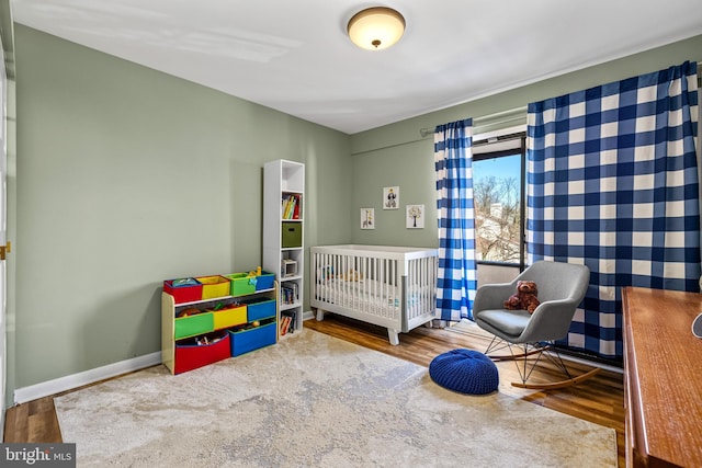 bedroom featuring hardwood / wood-style flooring