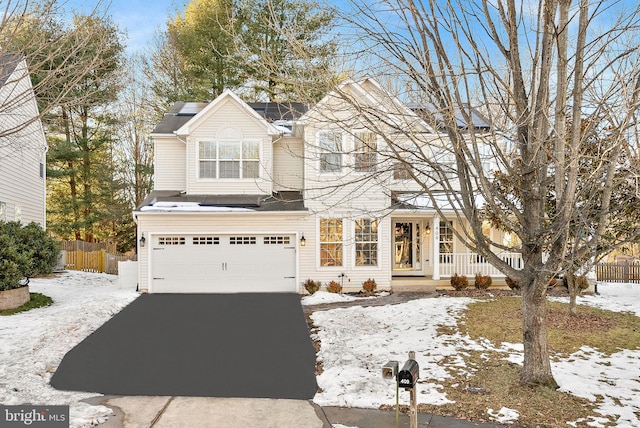 front of property with a garage