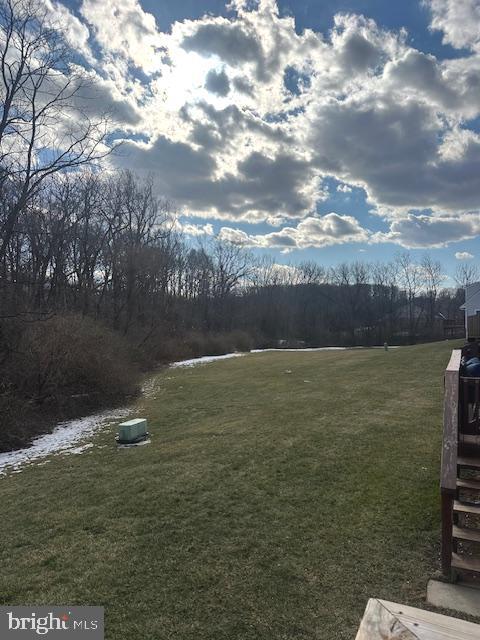 view of yard with a water view