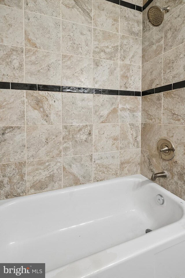 bathroom featuring bathtub / shower combination