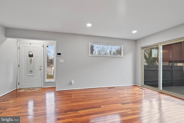 entryway featuring recessed lighting, baseboards, and hardwood / wood-style flooring