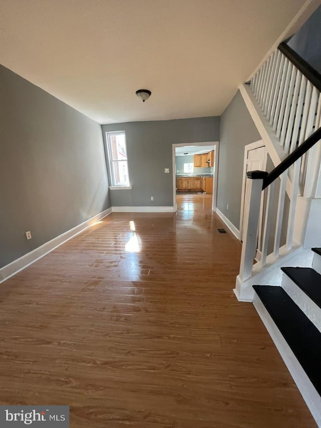 interior space with dark wood-type flooring