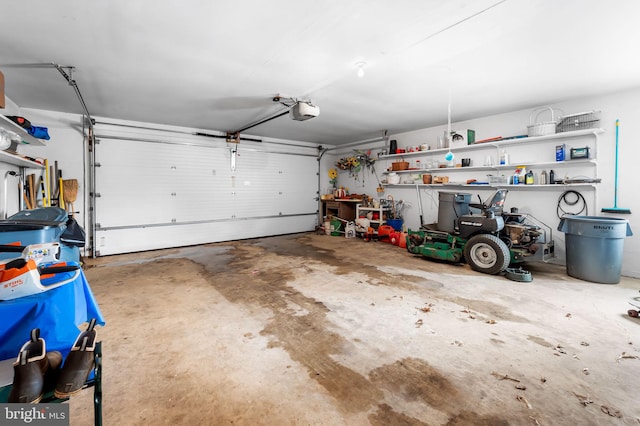 garage featuring a garage door opener