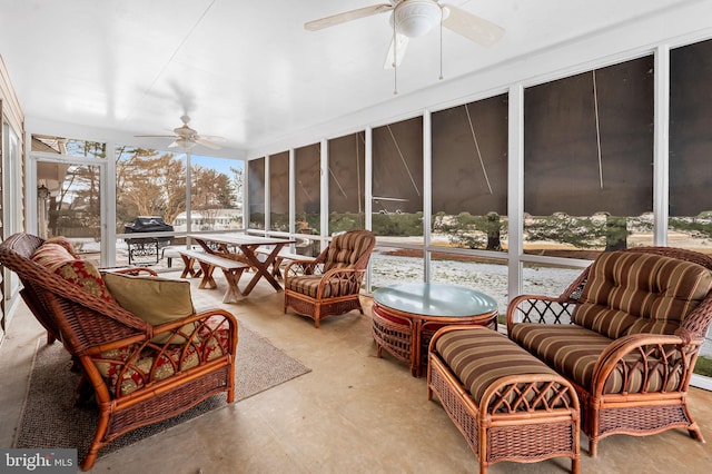 sunroom / solarium with ceiling fan