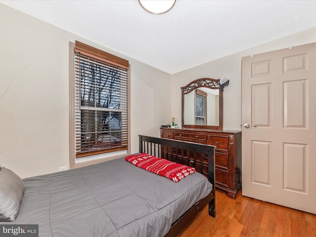 bedroom featuring light hardwood / wood-style flooring