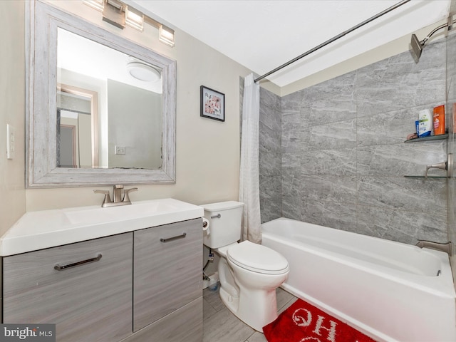 full bathroom featuring vanity, toilet, and shower / tub combo