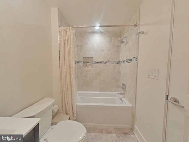 full bathroom featuring vanity, toilet, and shower / bath combo with shower curtain