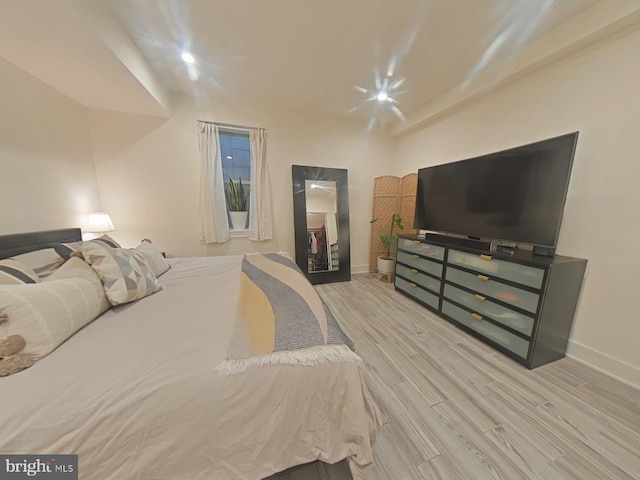 bedroom featuring wood-type flooring