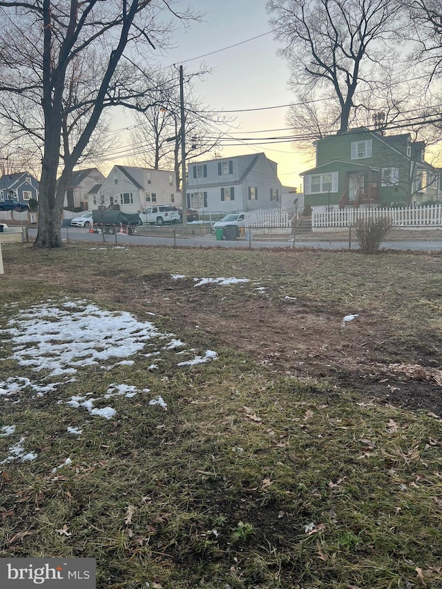 view of yard layered in snow