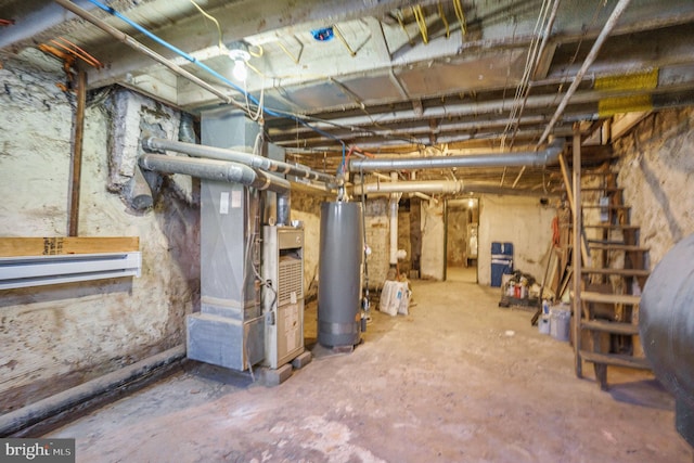 basement with heating unit and gas water heater