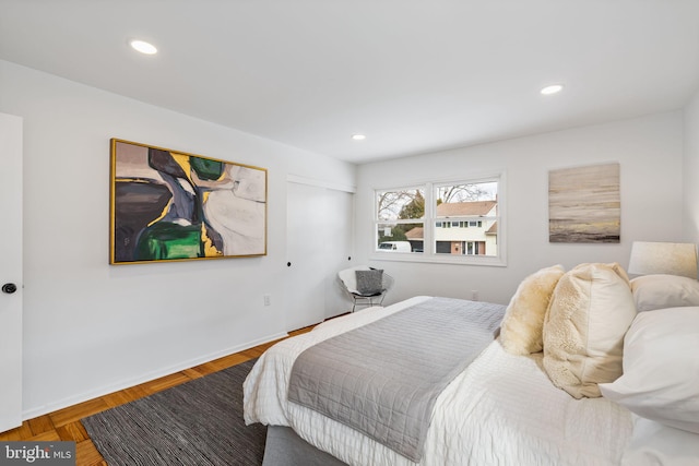 bedroom with hardwood / wood-style floors