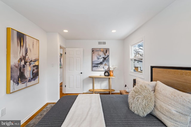 bedroom featuring hardwood / wood-style floors