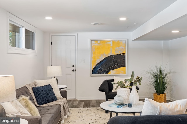 living room featuring dark hardwood / wood-style flooring