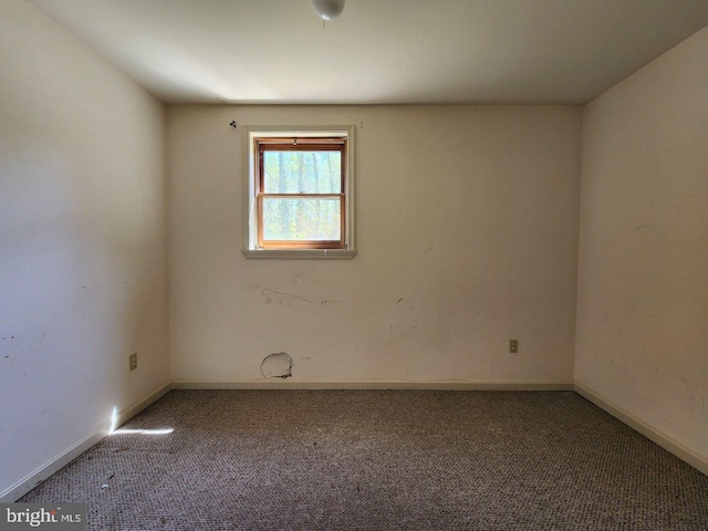 6212 8th St, Chesapeake Beach, MD 20732 - empty room featuring carpet flooring and baseboards