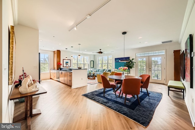 dining space featuring visible vents, light wood-type flooring, french doors, and recessed lighting