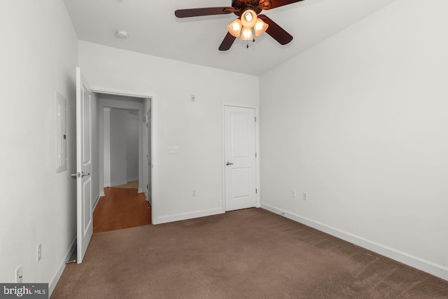 unfurnished bedroom with baseboards and carpet floors