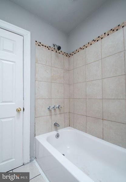 bathroom with shower / tub combination and tile patterned floors