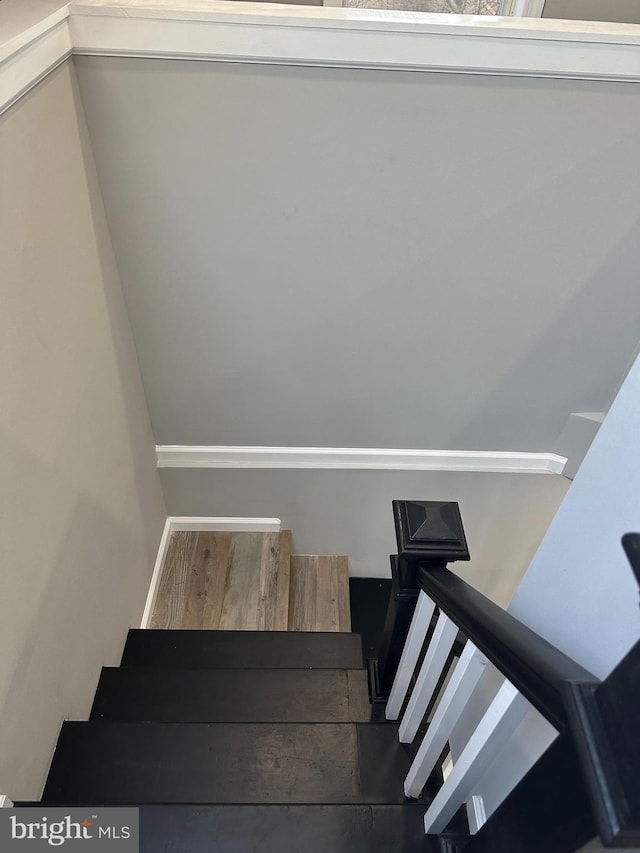 staircase with baseboards