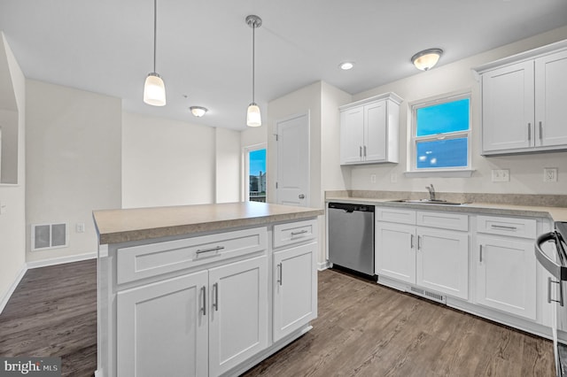 4 Landing Pl Unit 4, York, PA 17408 - kitchen featuring sink, white cabinetry, decorative light fixtures, dishwasher, and a kitchen island