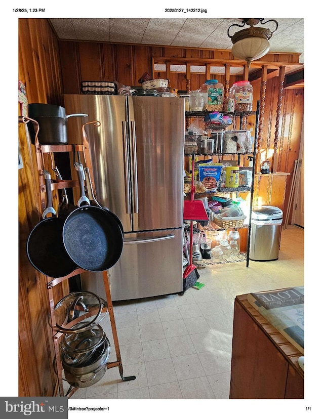 kitchen featuring stainless steel fridge