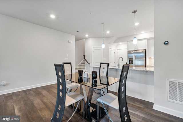 dining room featuring dark hardwood / wood-style floors