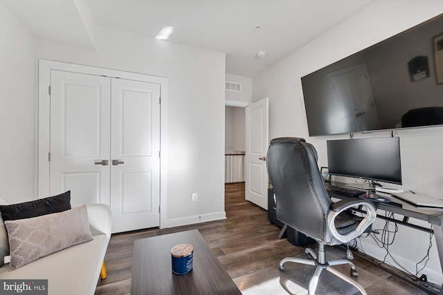 home office featuring dark hardwood / wood-style flooring