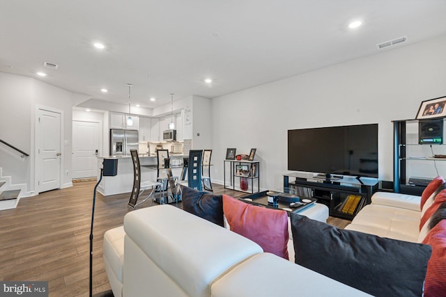 living room featuring hardwood / wood-style flooring