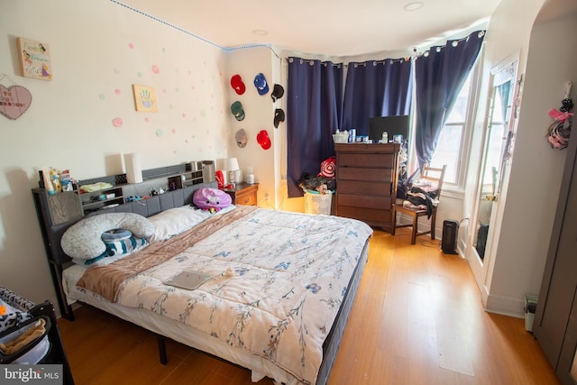 bedroom featuring hardwood / wood-style flooring