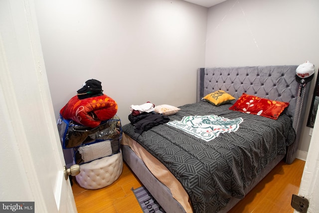 bedroom with light wood-type flooring