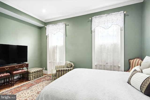 bedroom with crown molding