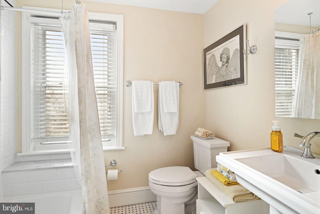 bathroom with sink and toilet