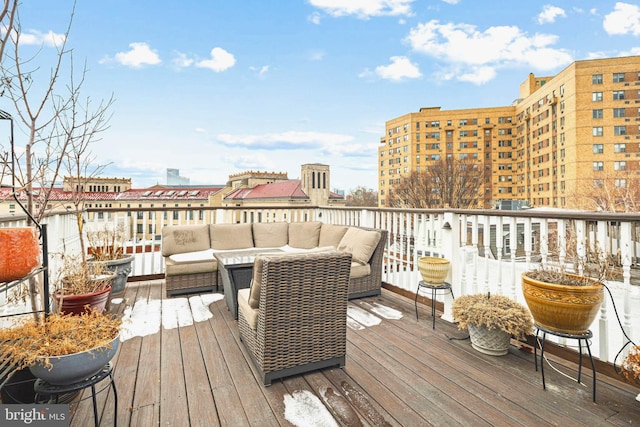 wooden terrace featuring outdoor lounge area