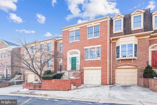 multi unit property featuring a garage