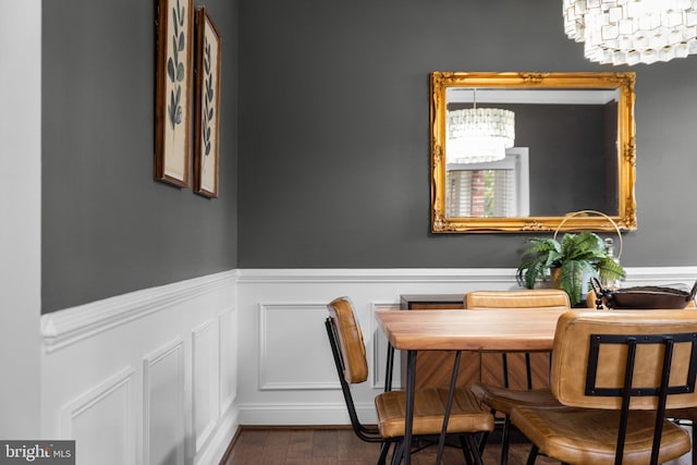 dining area featuring a chandelier