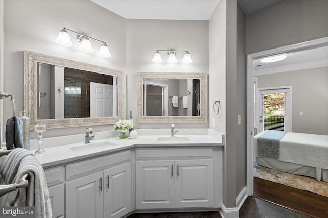 bathroom with vanity and a shower