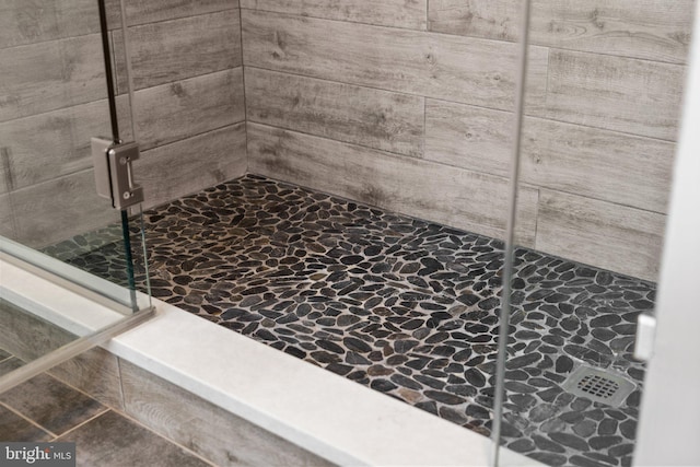 room details with a tile shower