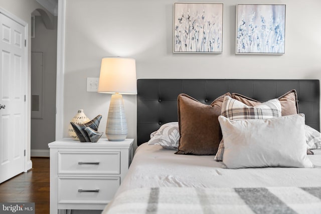 bedroom featuring dark wood-type flooring