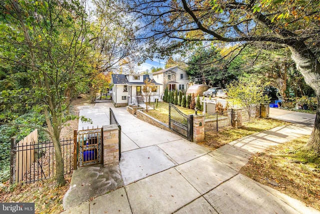 view of front of home with a gate and a fenced front yard