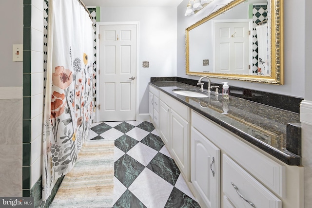 bathroom with vanity and curtained shower