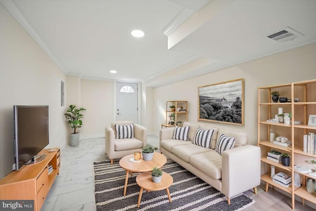 living room featuring crown molding