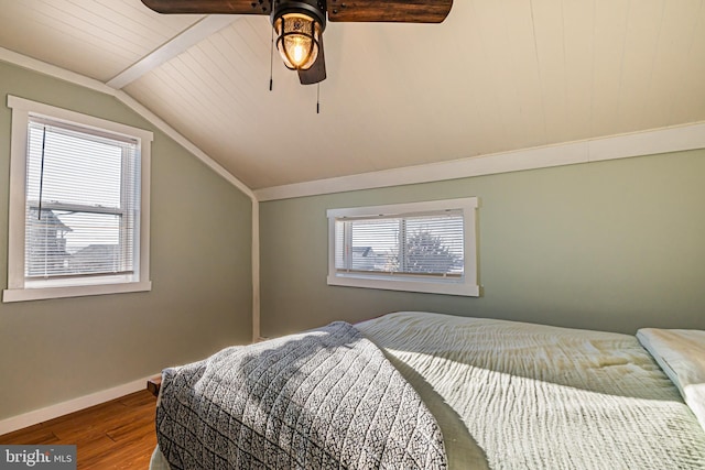 bedroom featuring ceiling fan, lofted ceiling, and hardwood / wood-style floors