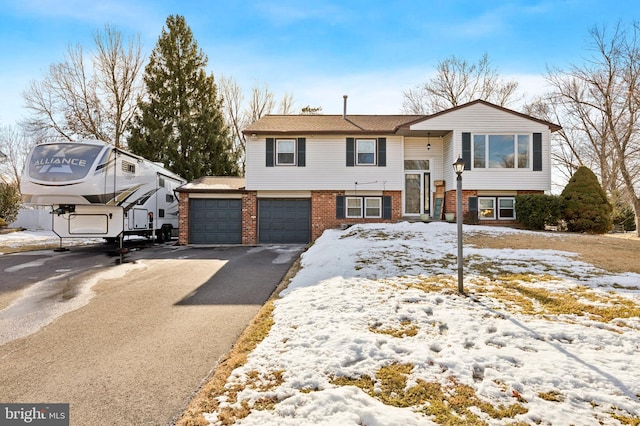 raised ranch with a garage