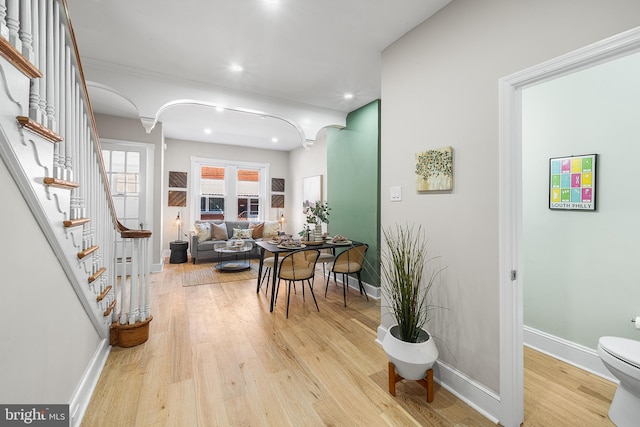 hall with light hardwood / wood-style flooring