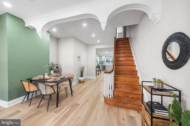 interior space featuring crown molding and wood-type flooring