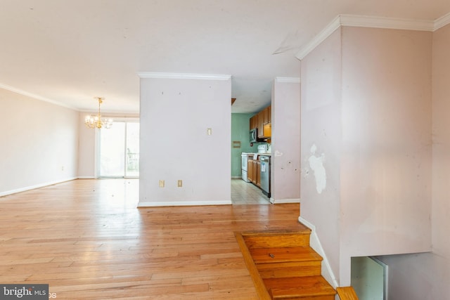 interior space featuring crown molding, light hardwood / wood-style flooring, and a notable chandelier