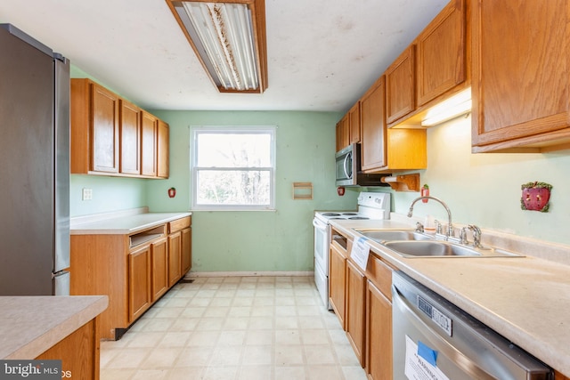 kitchen featuring stainless steel appliances and sink