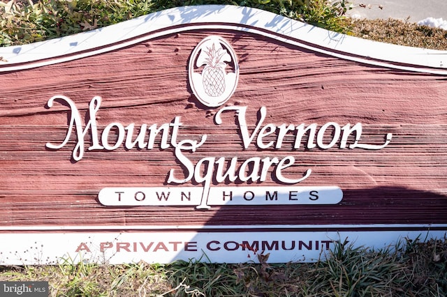 view of community sign