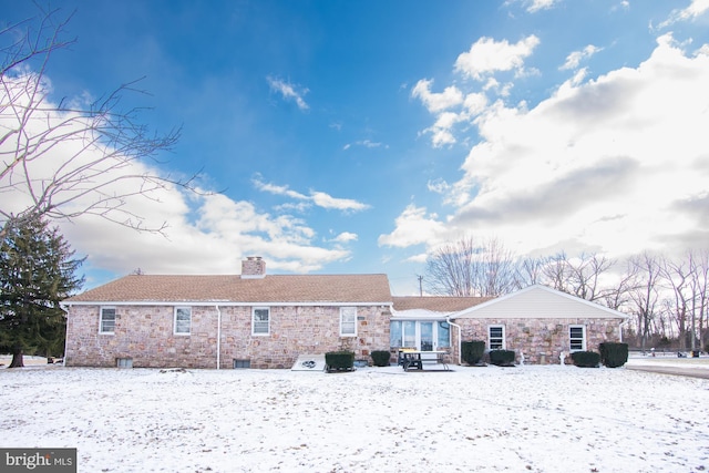 view of snow covered property