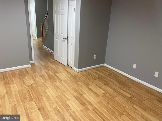 spare room with light hardwood / wood-style floors