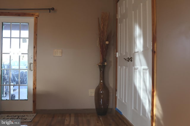 doorway featuring dark hardwood / wood-style flooring